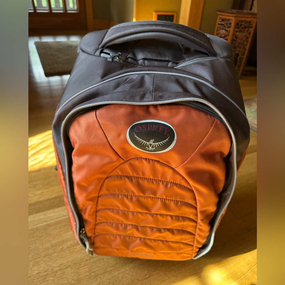 Osprey Vector Rolling Carry On Suitcase. Color: Orange.